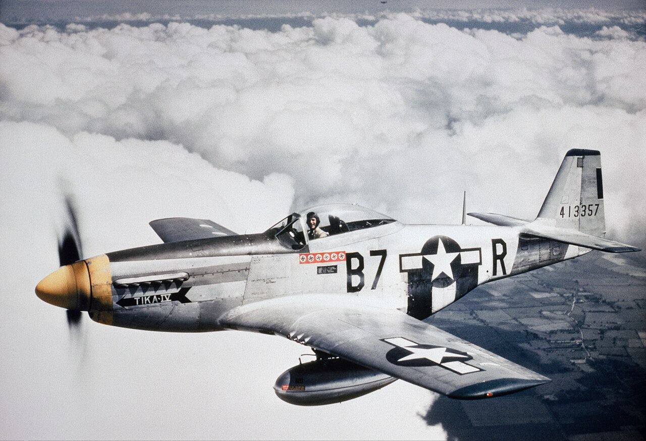 Silver Mustang P-51 in flight