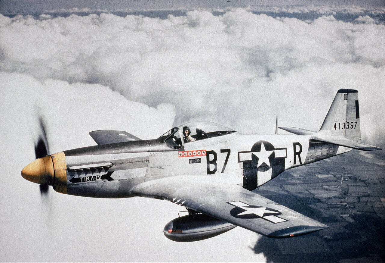 Silver Mustang P-51 in flight 